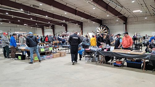 Tables featuring Pokémon cards, hockey cards and other goods capture the interest of attendees at the Westman Gaming Expo at the Keystone Centre on Saturday and Sunday. (Miranda Leybourne/The Brandon Sun)