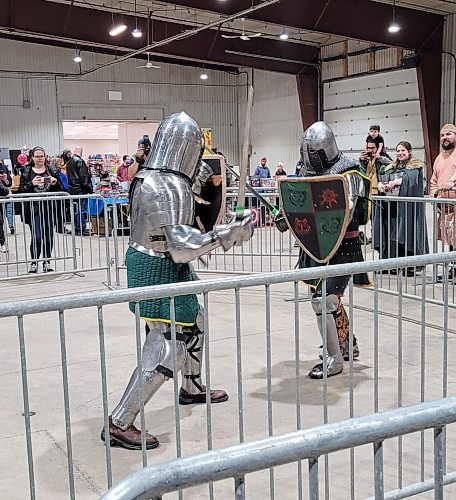 Two knights in shining armour square off against each other in a battle at the Westman Gaming Expo, held at the Keystone Centre on Saturday and Sunday. (Miranda Leybourne/The Brandon Sun)