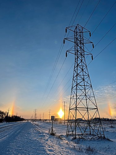 Ice crystals in the air create a sun dog around the rising sun on Monday morning, following the weekend blizzard. (Matt Goerzen/The Brandon Sun)