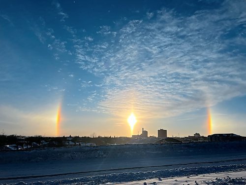 A bright sundog surrounds the rising sun on Monday morning, following a heavy weekend blizzard that dumped nearly 30 cm of snow on the city of Brandon, according to Environment Canada. (Matt Goerzen/The Brandon Sun)