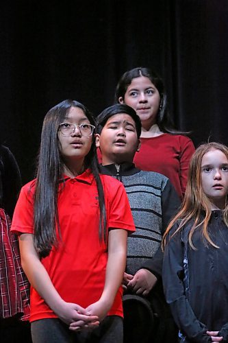 From left: Eli, Liam, Alitzel and Nadine from St. Augustine School's grade5/6 choir sing during the Brandon Festival of the Arts program at the Western Manitoba Centennial Auditorium on Tuesday afternoon. (Matt Goerzen/The Brandon Sun)