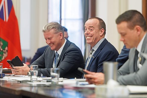 MIKE DEAL / FREE PRESS
Hydro board chair Ben Graham (left) shares a laugh with Manitoba Hydro&#x2019;s interim CEO Hal Turner (centre) during the Standing Committee on Crown Corporations, Thursday morning at the Manitoba Legislative Building, to discuss the Manitoba Hydro-Electric Board Annual Report for the fiscal year ending March 31, 2023.
240222 - Thursday, February 22, 2024.