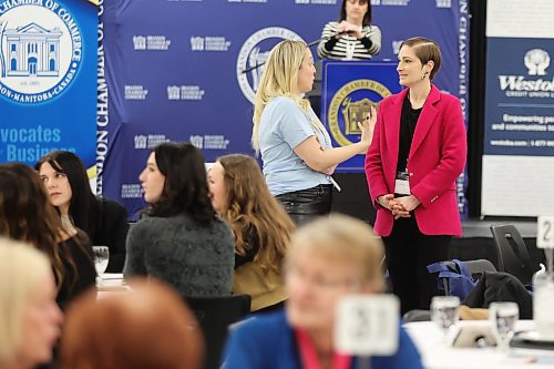 Catherine Wreford (right), brain cancer warrior and past winner of "The Amazing Race Canada," was the keynote speaker at this year's Women of Westman Conference, hosted by the Brandon Chamber of Commerce at the Keystone Centre on Wednesday. (Michele McDougall/The Brandon Sun)