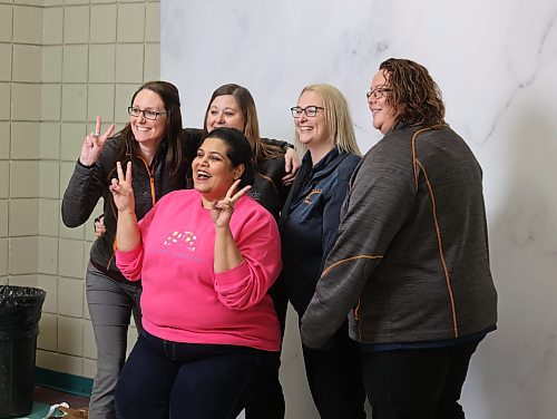 Women from Stride Credit Union in Neepawa pose for a photo in front of a photo booth during the conference. (Michele McDougall/The Brandon Sun)