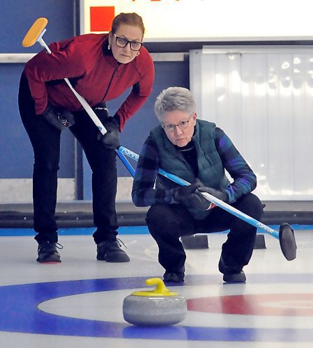 Games in the women's 55+ and 65+ divisions were all close, as teams needed extra ends or close shots on their final rocks before deciding who took home gold, silver or bronze. Here, two skips eye their next shots at the Brandon Curling Club during the three-day 55+ Manitoba Games curling event. (Jules Xavier/The Brandon Sun)