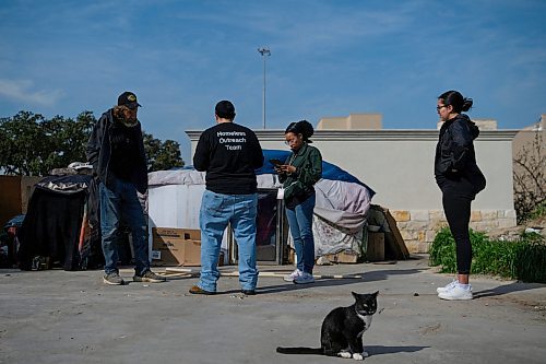 Callaghan O'Hare / FREE PRESS

Jessalyn Dimanno, Khena Minor and Fryda Ochoa, employees of the Coalition for the Homeless, visit Slim, who lives in a makeshift structure adjacent to a gas station, on Wednesday, February 14, 2024, in Houston, Texas. Houston has had significant success in getting people who were once homeless into housing, which prompted a visit from Winnipeg&#x2019;s mayor in September of 2023 to see what lessons could be learned.