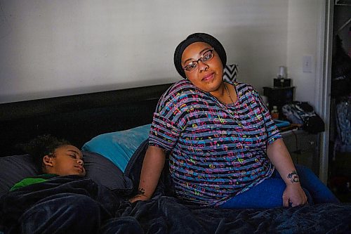 Callaghan O'Hare / FREE PRESS

Shalina Polkey, who used to be homeless, poses for a portrait while her son Jabriel Polkey, 3, sleeps in her bed at their home on Wednesday, February 14, 2024, in Houston, Texas. Houston has had significant success in getting people who were once homeless into housing, which prompted a visit from Winnipeg&#x2019;s mayor in September of 2023 to see what lessons could be learned.