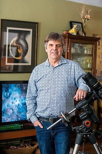 MIKAELA MACKENZIE / FREE PRESS

Richard Konrad, a hobbyist astrophotographer who now uses an online telescope access program to take photos, in his home on Wednesday, March 6, 2024. 


For Dave story.