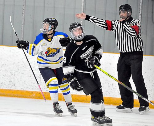 A dejected Eastman Selects rearguard Cassidy LeSage (3) looks on as the referee signals a goal after Westman Wildcats forward Marlie Rutherford scored her fourth goal of the playoffs Thursday night in Shoal Lake. The shorthanded goal gave the home team a 1-0 lead. (Photos by Jules Xavier/The Brandon Sun)