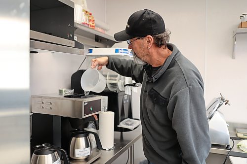 Green Spot Home and Garden owner Bernie Whetter brews coffee at the new Secret Garden Café on Friday. He says the Cafe plans to offer a standard café-style menu, featuring local products, including those from Forbidden Flavors, Tender Cuts Meat, and Cuypers Bakery. (Abiola Odutola/The Brandon Sun)