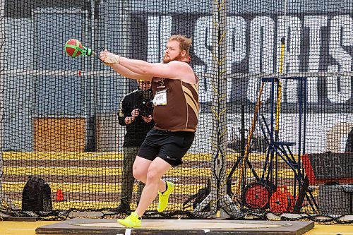 MIKE DEAL / FREE PRESS
UofM Bisons Graham Wright competes in the weight throw final at the U SPORTS track and field nationals being held at the UofM. 
See Joshua Frey-Sam story
240308 - Friday, March 08, 2024.