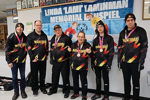 Left to right: Special Olympics athletes  Chris Jones, Devin Leadbeater, Glen Skayman, Sandra Revet, Tyler Yurchuk, and Scott Madder pose with their medals at a memorial bonspiel at Riverview Curling Club Saturday morning. (Geena Mortfield/The Brandon Sun)