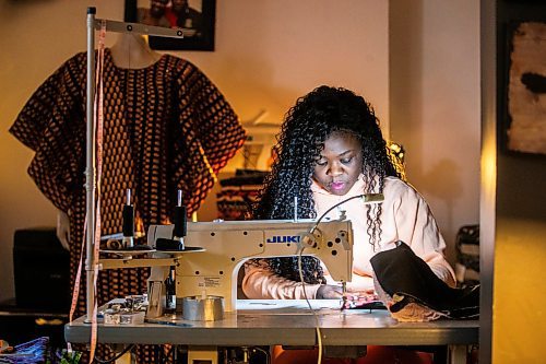 MIKAELA MACKENZIE / FREE PRESS

Oluwayemisi Josephine Ogunwale works on the bodice of a dress in her home studio on Monday, March 11, 2024. Ogunwale is a dressmaker who specializes in making custom-made outfits using Nigerian textiles.

For AV story.