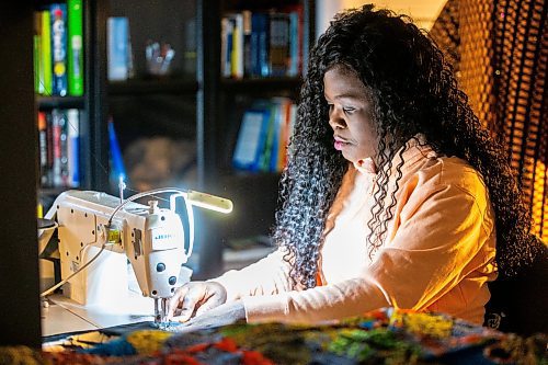 MIKAELA MACKENZIE / FREE PRESS

Oluwayemisi Josephine Ogunwale works on the bodice of a dress in her home studio on Monday, March 11, 2024. Ogunwale is a dressmaker who specializes in making custom-made outfits using Nigerian textiles.

For AV story.