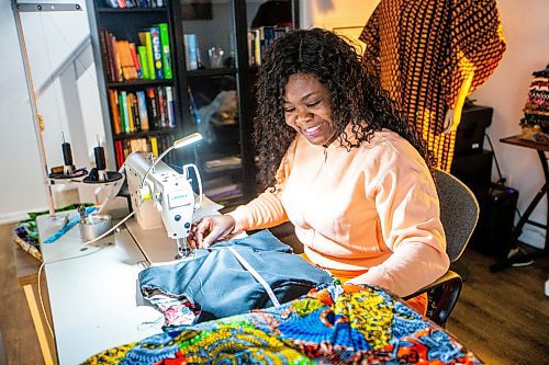 MIKAELA MACKENZIE / FREE PRESS

Oluwayemisi Josephine Ogunwale works on the bodice of a dress in her home studio on Monday, March 11, 2024. Ogunwale is a dressmaker who specializes in making custom-made outfits using Nigerian textiles.

For AV story.