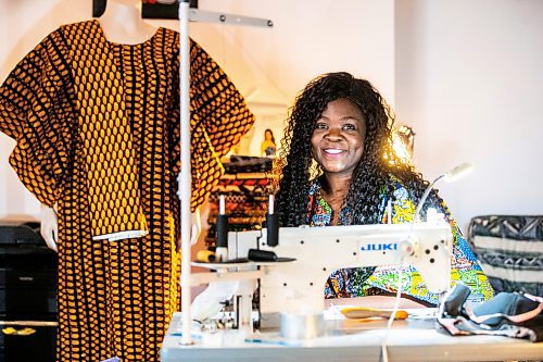 MIKAELA MACKENZIE / FREE PRESS

Oluwayemisi Josephine Ogunwale in her home studio on Monday, March 11, 2024. Ogunwale is a dressmaker who specializes in making custom-made outfits using Nigerian textiles.

For AV story.