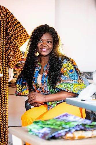 MIKAELA MACKENZIE / FREE PRESS

Oluwayemisi Josephine Ogunwale in her home studio on Monday, March 11, 2024. Ogunwale is a dressmaker who specializes in making custom-made outfits using Nigerian textiles.

For AV story.