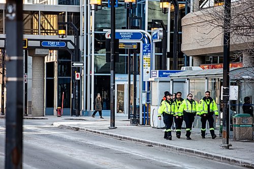 MIKAELA MACKENZIE / FREE PRESS

Transit safety officers walk down Graham Avenue on their first day on the job on Tuesday, Feb. 20, 2024. 

For Chris story.
