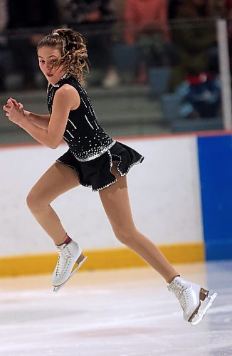 Brooke H. spins in the air before completing a jump. (Matt Goerzen/The Brandon Sun)