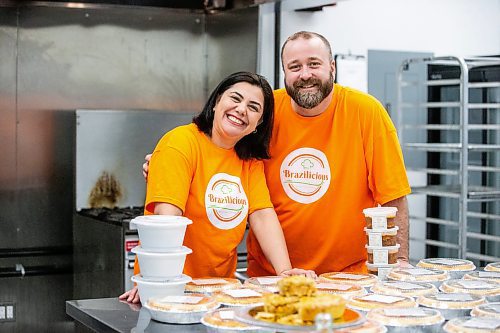 MIKAELA MACKENZIE / FREE PRESS

Marli Cordella (left) and Giuliano Roveri, owners of Brazilicious, with freshly made chicken pies and other frozen dishes in their commercial kitchen in Winnipeg on Wednesday, March 13, 2024.  They both hail from Sao Paulo, Brazil, and started a food biz in November offering a taste of home.

For Dave Sanderson story.