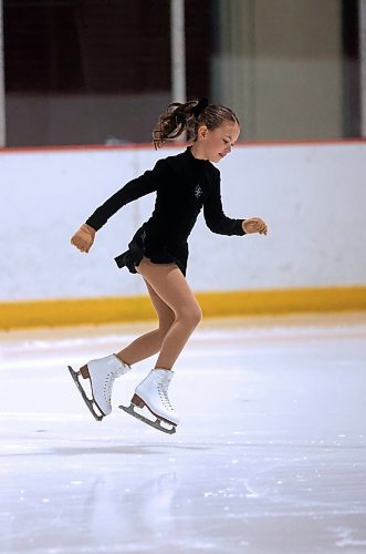 Zoe Freeman jumps off the ice during her Skate Brandon performance on Tuesday night at the Flynn Arena. (Matt Goerzen/The Brandon Sun)