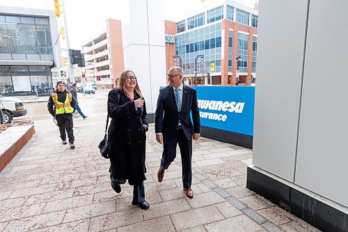 MIKE DEAL / WINNIPEG FREE PRESS
Kate Fenske the CEO of Downtown Winnipeg BIZ and Winnipeg Mayor, Scott Gillingham, arrive for the opening of the new headquarters for Wawanesa Insurance at 236 Carlton St., at True North Square, in downtown Winnipeg, Wednesday morning.
240313 - Wednesday, March 13, 2024.