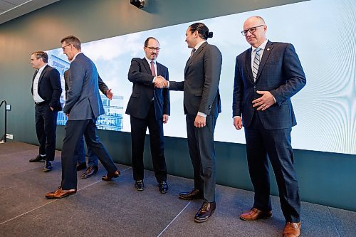 MIKE DEAL / WINNIPEG FREE PRESS
Manitoba Premier, Wab Kinew, shakes hands with Wawanesa's CEO, Jeff Goy, during the opening of the new Wawanesa Insurance headquarters at 236 Carlton St., at True North Square, in downtown Winnipeg, Wednesday morning.
240313 - Wednesday, March 13, 2024.