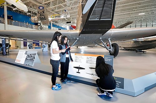 RUTH BONNEVILLE / WINNIPEG FREE PRESS 

BIZ - aviation days

Students from St. John's High School take part in a scavenger hunt with fellow students to learn more about the different aircraft during Aviation Days at the Royal Aviation Museum of Western Canada on Monday. 

Names of students:
Danielle Gatiwan  (blue)
Catelyne Melliza (grey vest)
Althea Mayol (white shirt)


Story: The Royal Aviation Museum of Western Canada is hosting &#x504;iscovery Days,&#x560;where high school students learn more about aviation and aerospace careers. The industry is anticipating a shortage of workers in the coming years.

Story by Gabby

April 6th, 2023