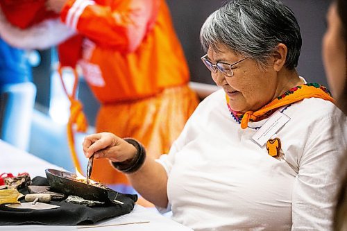 MIKAELA MACKENZIE / FREE PRESS

Maata Evaluardjuk-Palmer lights the qulliq before a funding announcement for the National Centre for Truth and Reconciliation in Winnipeg on Thursday, March 14, 2024.  

For Malak story.