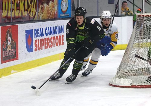 Brandon Wheat Kings defenceman Rhett Ravndahl (5), shown carrying the puck with Saskatoon Blades forward Rhett Melnyk (9) in hot pursuit during a recent game, said his team can learn from its most recent loss to the Prince Albert Raiders as they welcome back their Saskatchewan opponent to Westoba Place tonight. (Perry Bergson/The Brandon Sun)
