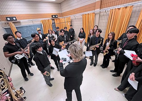 Band teacher Jaclyn Loganberg goes over a few last-minute details with the Winnipeg-based band iJazz from Maples Collegiate in Winnipeg before performing on Friday afternoon at the Lorne Watson Recital Hall during BU's three-day Jazz Festival. (Matt Goerzen/The Brandon Sun)