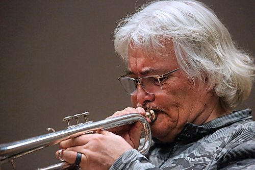 Brandon University Prof. Edward Bach, an accomplished trumpeter and master musical clinician, plays a few notes on his trumpet while leading a masterclass on the instrument on Friday afternoon, part of BU's three-day Jazz Festival. (Matt Goerzen/The Brandon Sun)