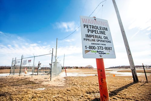 MIKAELA MACKENZIE / FREE PRESS

Imperial Oil pipeline signs just south of St. Adolphe, near the Red River, on Monday, March 18, 2024.  The company has decided to shut down the pipeline and undertake repairs after pipeline inspections identified integrity concerns.

For Katie/Tyler story.