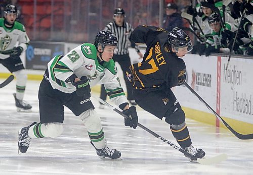 Prince Albert Raiders forward Sloan Stanick of Rapid City and Brandon Wheat Kings defenceman Luke Shipley battle for the puck on March 1 at Westoba Place. Stanick made 11 regular season visits to Brandon during his career. (Thomas Friesen/The Brandon Sun)