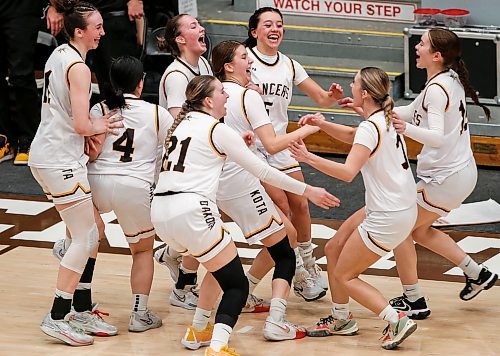 JOHN WOODS / FREE PRESS
Dakota Lancers celebrate a win over the Garden City Gophers in the AAAA Provincial Basketball Championship at the University of Manitoba Monday, March 18, 2024.  

Reporter: mike