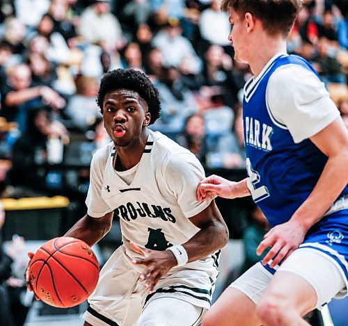 JOHN WOODS / FREE PRESS
Oak Park Itay Koifman-Chagin (2) defends against Vincent Massey Jeremiah Ige (4)  in the AAAA Provincial Basketball Championship at the University of Manitoba Monday, March 18, 2024.  

Reporter: mike