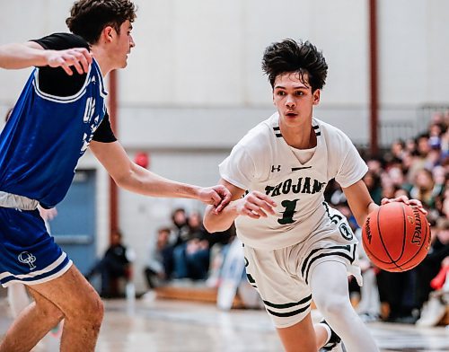 JOHN WOODS / FREE PRESS
Oak Park Adrian Ortega Pelegrin (13) defends against Vincent Massey Magnus Carlos (1)  in the AAAA Provincial Basketball Championship at the University of Manitoba Monday, March 18, 2024.  

Reporter: mike