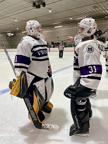 Vincent Massey Vikings goaltenders Casey Berry (left) and Sawyer Wallin have a ritual at the end of WHSHL games. Here, the two hug after their 7-2 victory during Game 2 at Enns Brothers Arena over the Neepawa Tigers. The two teams play Game 3 tonight in Neepawa, winner hoisting the WHSHL trophy. (Photos by Jules Xavier/The Brandon Sun)