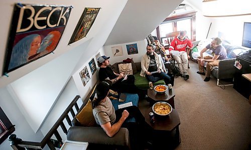 JOHN WOODS / FREE PRESS
Sean Gutheil, from left, Jordan Bodnar, Danny L&#xfc;tz, Garrett Wellwood and Sean Soloway talk and listen to records at their monthly record club in Soloway&#x2019;s house Sunday, February 18, 2024. It is the fifth anniversary of the club. 

Reporter: dave