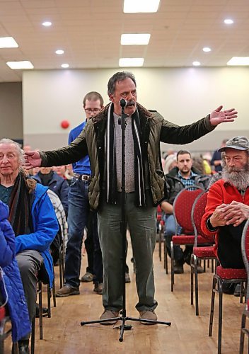 Brandon resident Paul Spiropoulos questions the City of Brandon panel regarding the city's recent decision to increase taxes, and its apparent inability to repair city roads and "clean up" the city's downtown district. (Matt Goerzen/The Brandon Sun)
