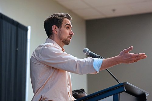 Ryan Nickel, director of planning and buildings at the City of Brandon, attempts to answer a question from the crowd during a 'come and go' open house session that was meant to unveil the Brandon's draft 30-year City Plan on Wednesday afternoon.  (Matt Goerzen/The Brandon Sun)