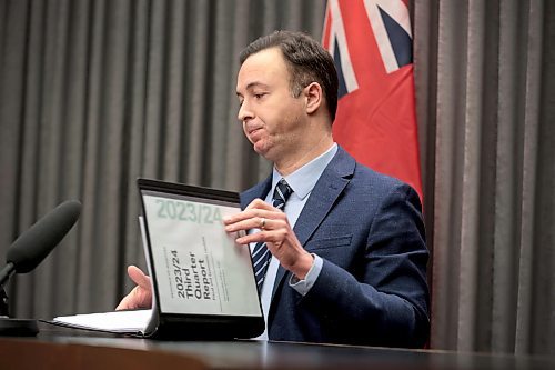 Finance Minister Adrien Sala breaks the bad news at a press conference at the Legislative Building on Friday, saying Manitoba's projected deficit for the 2023-24 fiscal year has reached almost $2 billion. He has also ordered audits of several health regions, including Prairie Mountain Health. See story on page A3. (Ruth Bonnevile/Winnipeg Free Press)