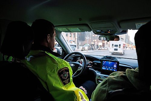 MIKE DEAL / WINNIPEG FREE PRESS
Sean Berman Safety Officer Supervisor drives along Portage Avenue provides support to the Community Safety Officers who are patroling downtown streets early Friday morning.
See Malak Abas story
240322 - Friday, March 22, 2024.