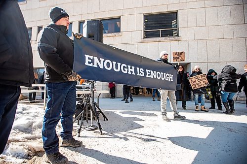 MIKAELA MACKENZIE / FREE PRESS

Lee Seiler (left) and Terry G. (no last name given) hold a banner at a rally calling for an end to the &#x4a3;atch and release&#x4e0;of the justice system outside of the Law Courts in Winnipeg on Friday, March 22, 2024. 

For Gabby story.