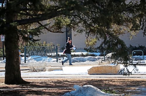 A woman walks in front of Brandon University's George T. Richardson Centre library facility on Friday afternoon. (Matt Goerzen/The Brandon Sun)