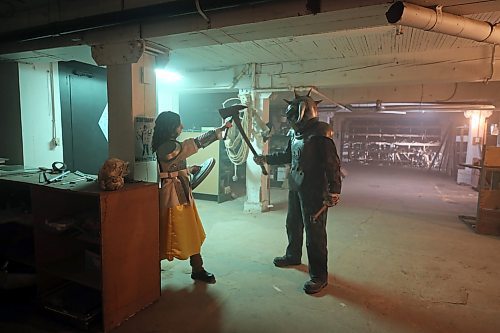 Co-stars Nadine McLachlan (left) and Mark Kiazyk (right) practice choreography for the final fight sequence for independent movie The Princess and the Dragon in the basement of Brandon's Building Re-Fit Store on Sunday. Filmed in Ninette and Brandon, the horror movie is aiming for an October release. (Colin Slark/The Brandon Sun)