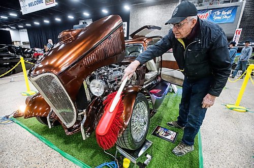 JOHN WOODS / FREE PRESS
John Routledge dusts his '33 Ford at the World of Wheels at the Convention Centre in Winnipeg Sunday, March 24, 2024. 

Reporter: standup