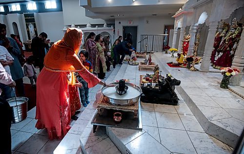 JOHN WOODS / FREE PRESS
People worship and make offerings at Holi celebrations at the Hindu Society of Manitoba Temple on St Anne&#x2019;s in Winnipeg Sunday, March 24, 2024. 

Reporter: Ramona