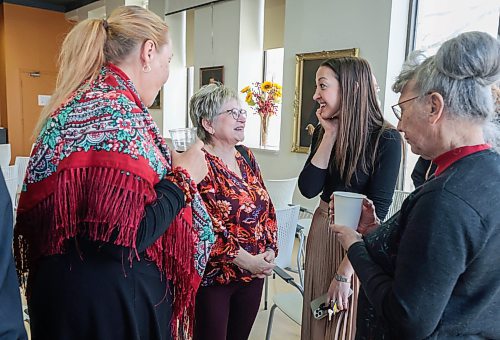 RUTH BONNEVILLE / FREE PRESS

 LOCAL - Ukrainian stdup 

Darusia Kozelko, President of the Ukrainian Cultural Foundation (short hair glasses) chats with Alexandra Shkandrij, Curator of Collections and Exhibits (long hair), Joanne Lewandowski (right) and Hannya Klimenko volunteer at Oseredok (pony tail) during Oseredok's  80th anniversary kick-off reception Monday.   This kickoff event is the beginning of many future events that we will showcase throughout the year leading up to our 80th Anniversary Gala in November at the Canadian Museum for Human Rights. 

Oseredok Ukrainian Cultural and Educational Centre  is committed to preserving and promoting Ukrainian - Canadian culture.

The afternoon entailed looking over the past 80 years of support, outreach, and growth of Oseredok. Oseredok is one of North America's largest Ukrainian heritage resource centres with a museum, art gallery, archives, cultural programming and  boutique.


March 25th,  2024