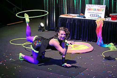 Amanda &quot;Panda&quot; Syryda, the star of the Hula Hoop Circus from Edmonton, AB., moves a giant hoop on her foot as part of her early afternoon show on Monday during the first day of the Royal Manitoba Winter Fair. (Matt Goerzen/The Brandon Sun)